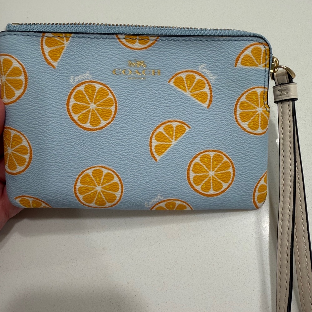 Coach Orange Slice Print Wristlet